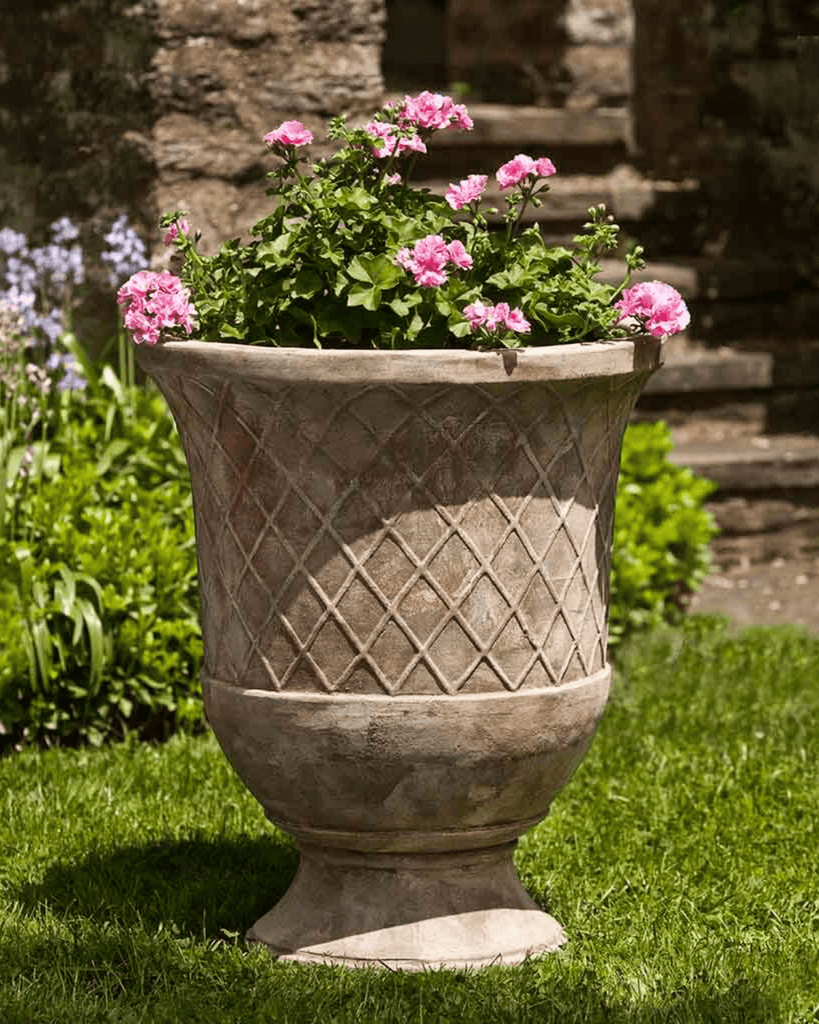 Showcase your blooms in style. Our elegant planters bring timeless charm to any outdoor space